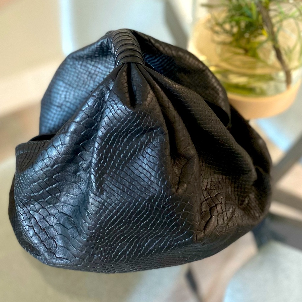 Cleobella black leather clutch or handle bag. Great condition inside and out.